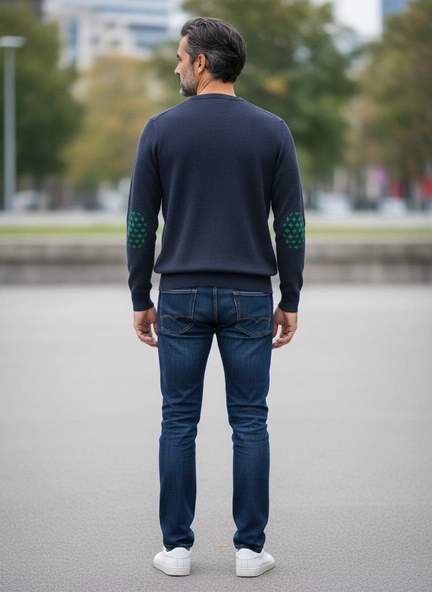 Baie des Caps navy blue fine knit wool sweater with green fleur-de-lis elbow patches and shoulder buttons.